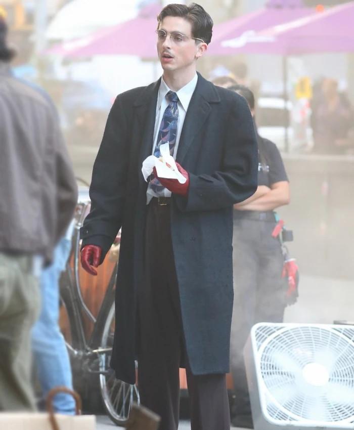 Timothee-Chalamet-Marty-Supreme-Trending-Black-Coat-side Timothée Chalamet Marty Supreme Trending Black Coat